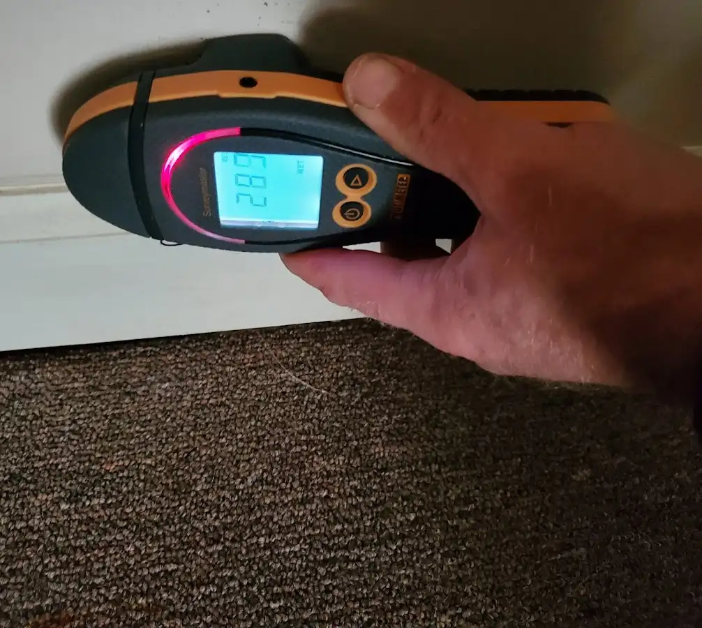 Moisture detection at baseboard during Storm Damage Restoration in Pleasanton